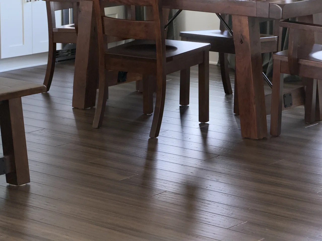 Dining room hardwood floor gleaming after cleaning